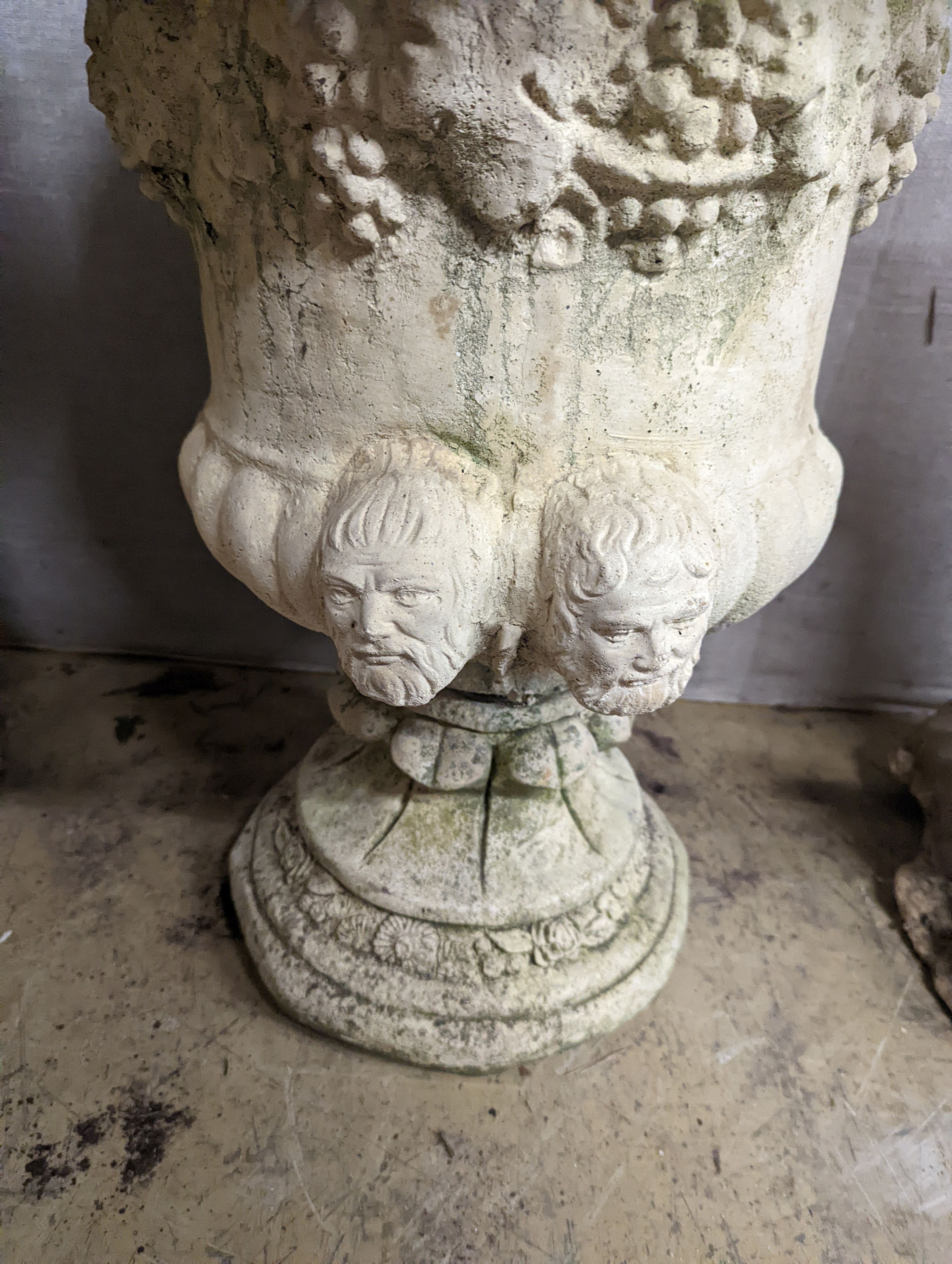 A pair of reconstituted stone campana garden urns, diameter 54cm, height 64cm